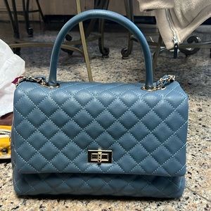Gray Quilted chic bag with gold link chain.